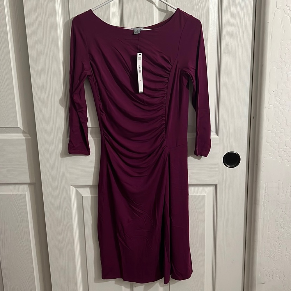 DKNY Chic Dress from day to night in sheath dress, accented by a banded waist.
